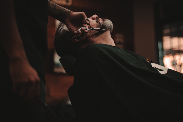 Professional barber haircut service at modern salon