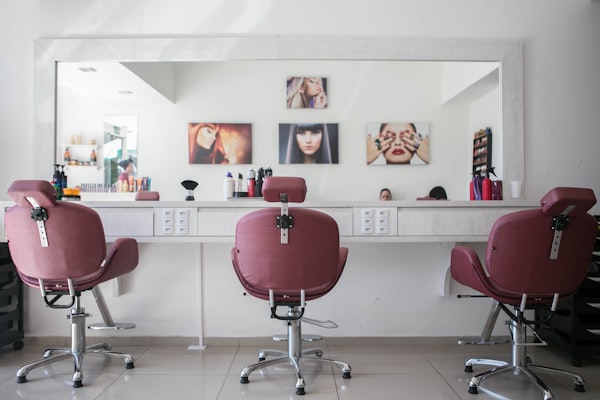 Full-service salon interior with styling chairs